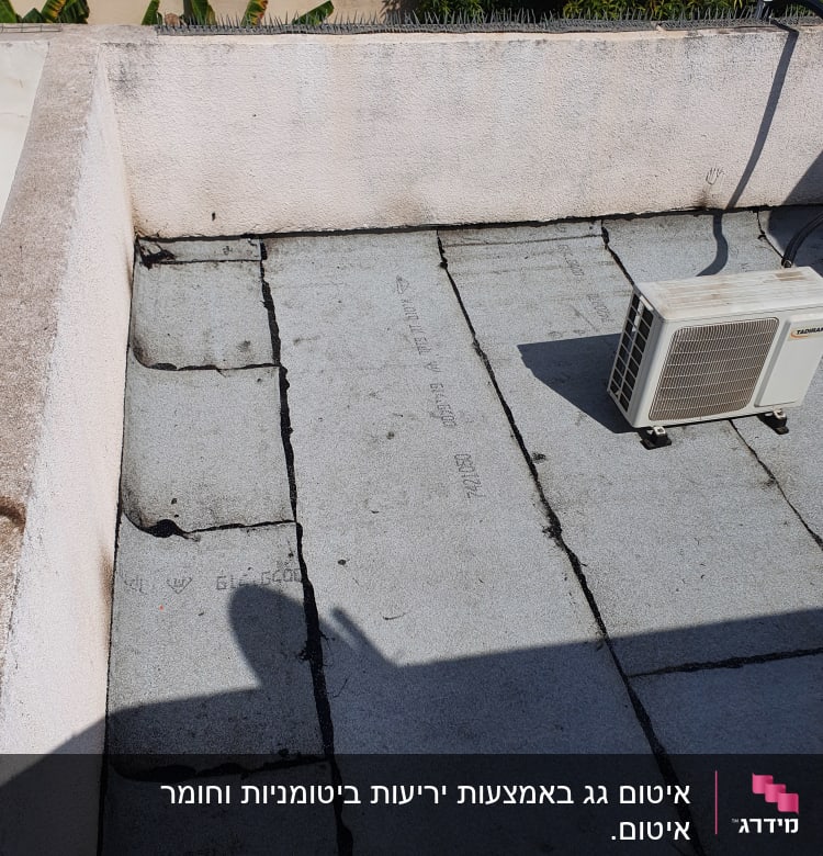 Roof with sealing material and air conditioning unit